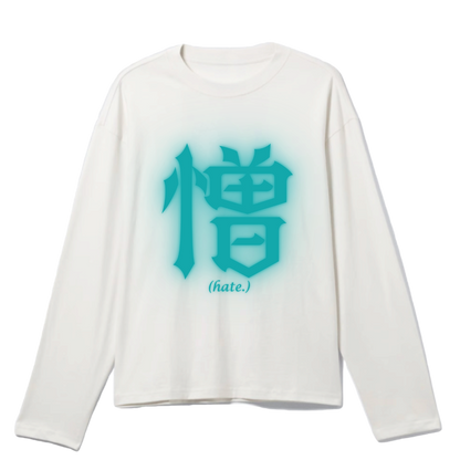 White long-sleeve shirt with turquoise designs on a white background